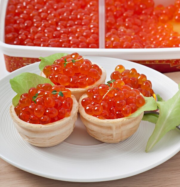 Tartlets with red caviar