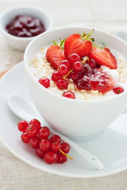 Tasty breakfast with cereals and strawberries