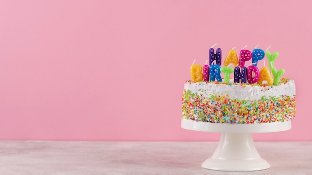 Tasty cake with birthday candles