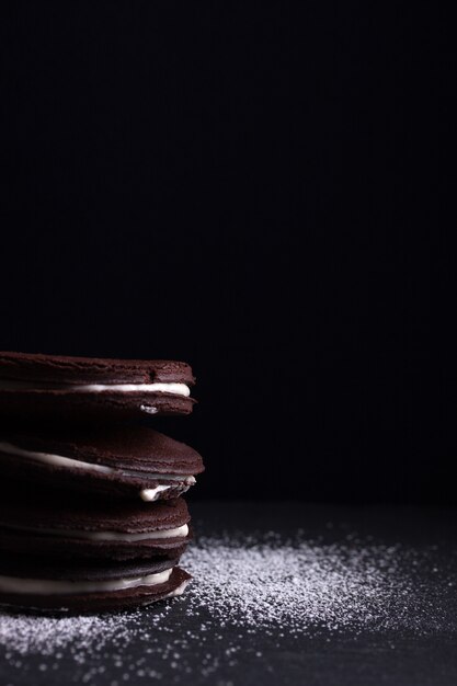 Tasty chocolate cookies with black background