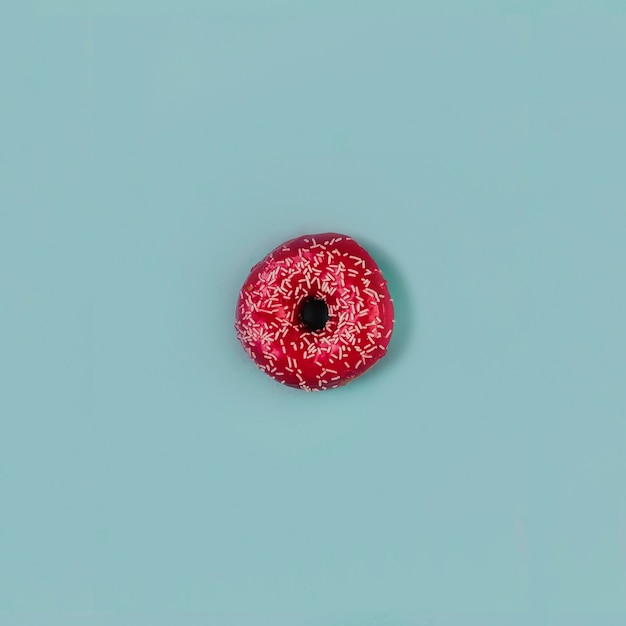 Free Photo tasty donut on blue