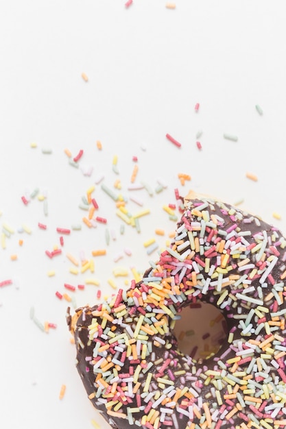 Free Photo tasty eaten chocolate donut with a missing bite isolated on white backdrop