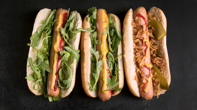 Free photo tasty fast-food hot dog flat lay