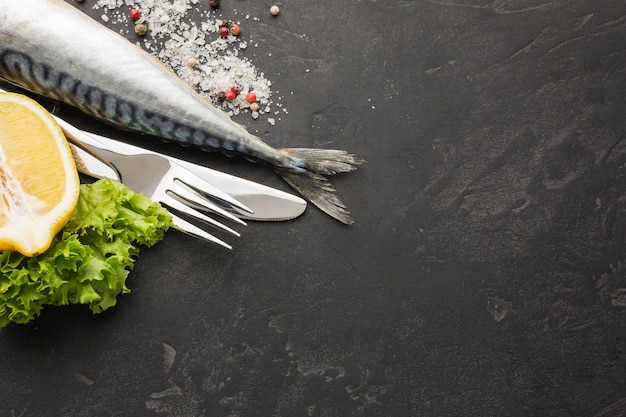 Free photo tasty fish arrangement flat lay