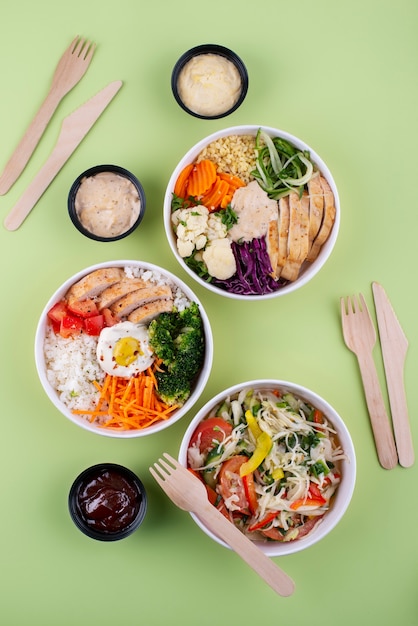 Tasty food bowls arrangement top view