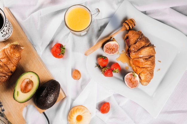 Tasty food for breakfast on white background