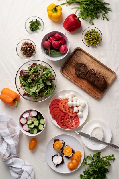 Free photo tasty food on table arrangement flat lay