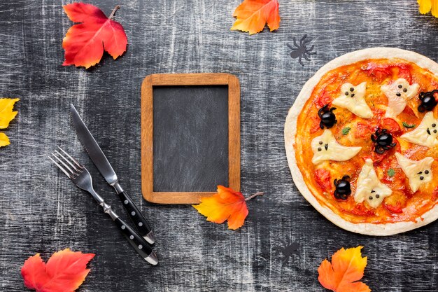 Tasty halloween pizza with mock-up frame