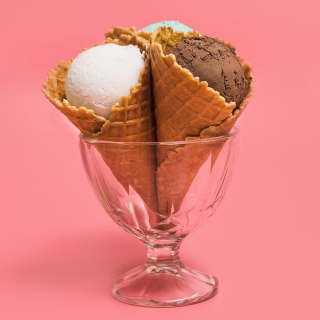 Tasty ice cream cups in bowl