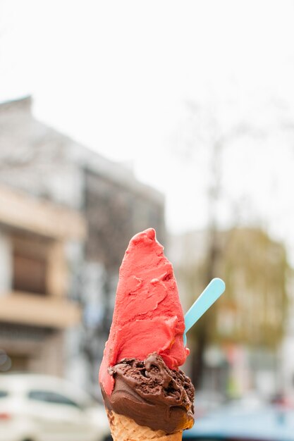 Tasty ice cream with urban background