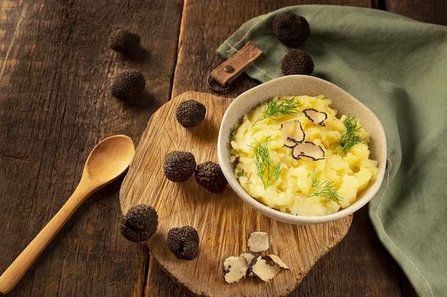 Free Photo tasty mashed potatoes with truffle high angle