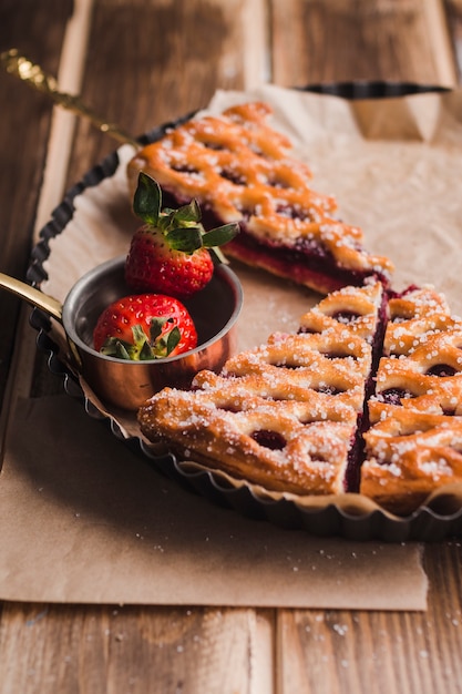 Free photo tasty pie sprinkling with powdered sugar