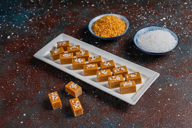 Free Photo tasty salty caramel fudge candies with sea salt