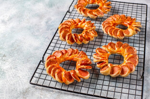 Tasty sausages wrapped in puff pastry.