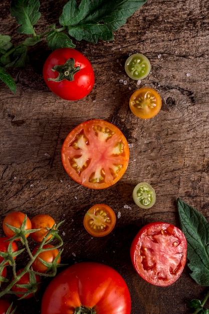 Tasty tomatoes arrangement flat lay