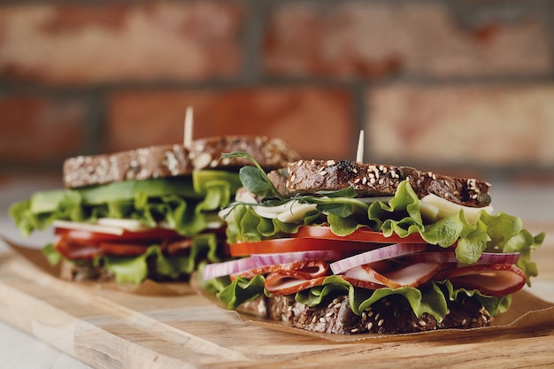 Free Photo tasty vegan sandwich over wooden table