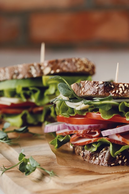 Free Photo tasty vegan sandwich over wooden table