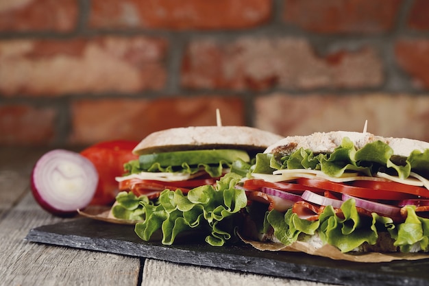 Free Photo tasty vegan sandwich over wooden table