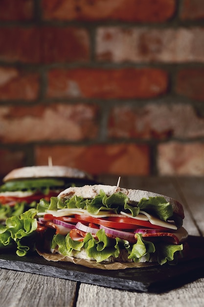 Free Photo tasty vegan sandwich over wooden table