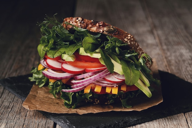 Free Photo tasty vegan sandwich over wooden table