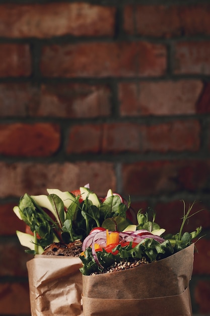 Tasty vegan sandwich over wooden table