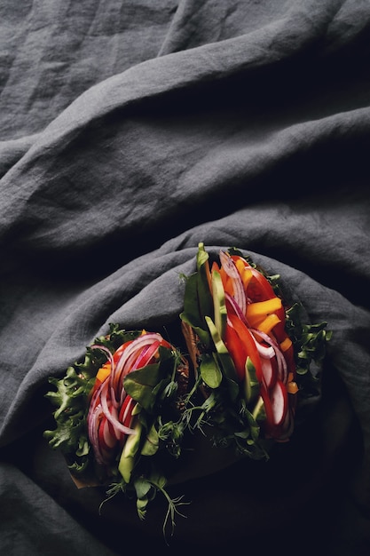 Free photo tasty vegan sandwich over wooden table