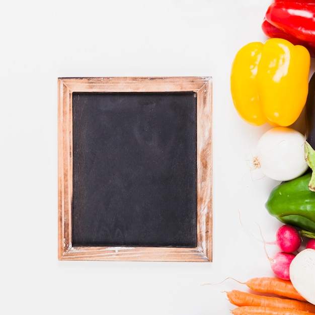 Free photo tasty vegetables and slate