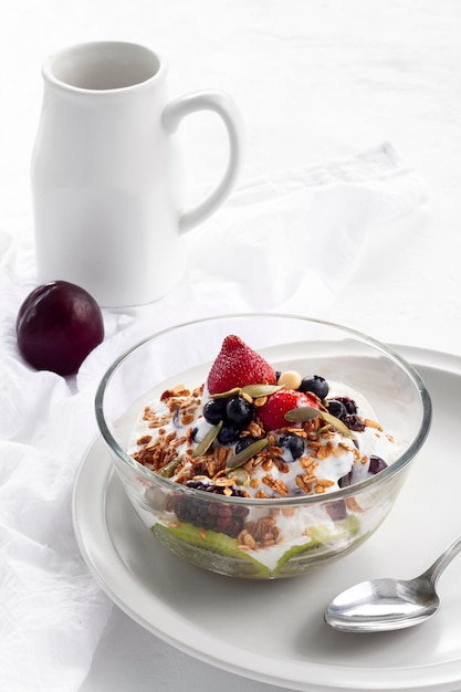 Tasty yogurt with cereals and fruits