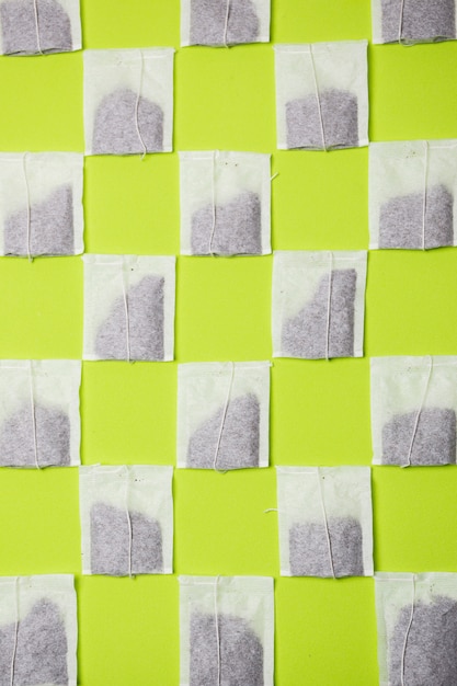 Free Photo tea bag pattern on neon background