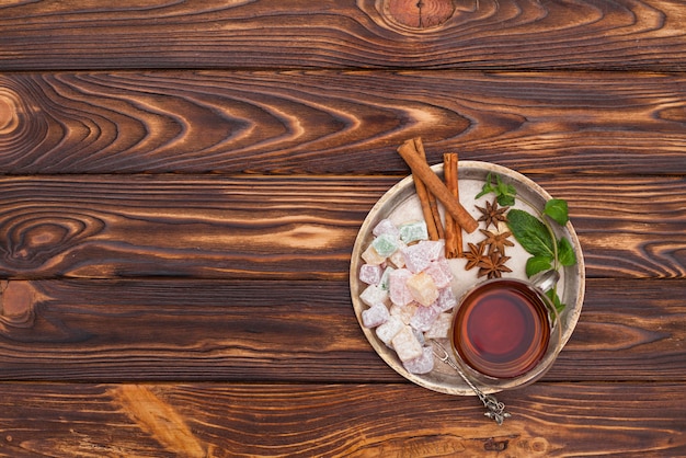 Tea cup with Turkish delight on plate