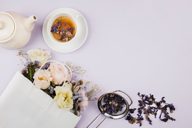 Tea herbs and flowers in flat lay