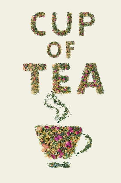 Free Photo tea leaf with flowers and fruit word cup of tea, top view