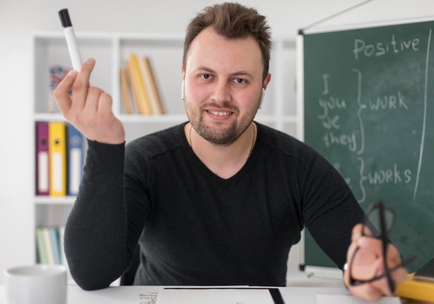 Free Photo teacher doing an english lesson online for his students