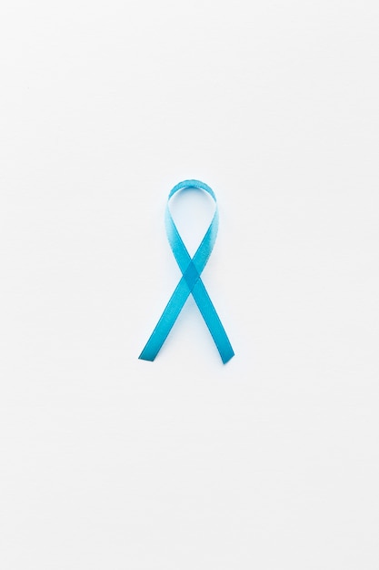 Free photo teal ribbon on white background