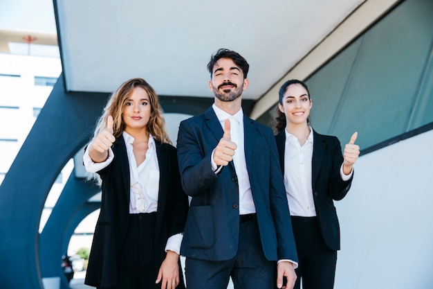 Free photo team of architects making thumbs up gesture