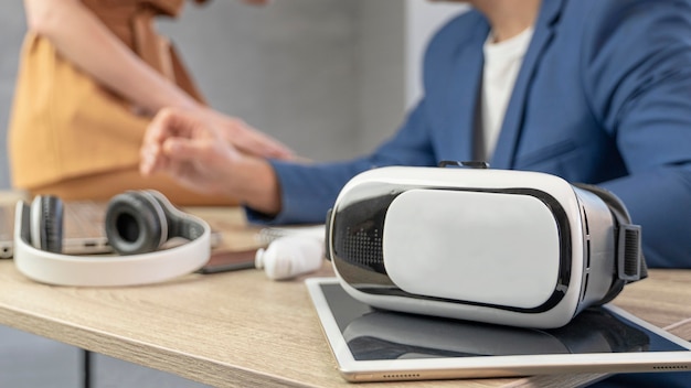 Team of man and woman working in the media field with virtual reality headset