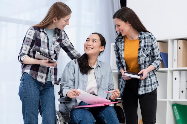 Free photo team supporting invalid woman