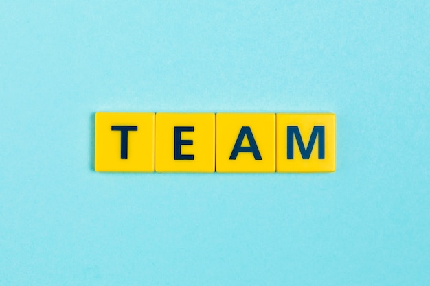 Free photo team word on scrabble tiles