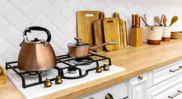 Free photo teapot on kitchen stove interior design