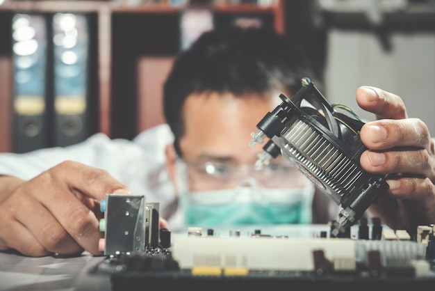 Free photo the technician repairing the computer,computer hardware, repairing, upgrade and technology