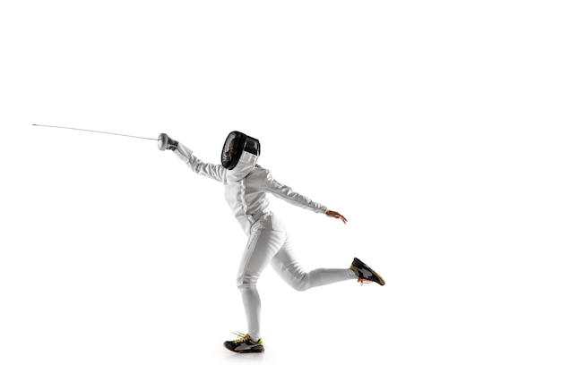 Teen girl in fencing costume with sword in hand isolated on white background