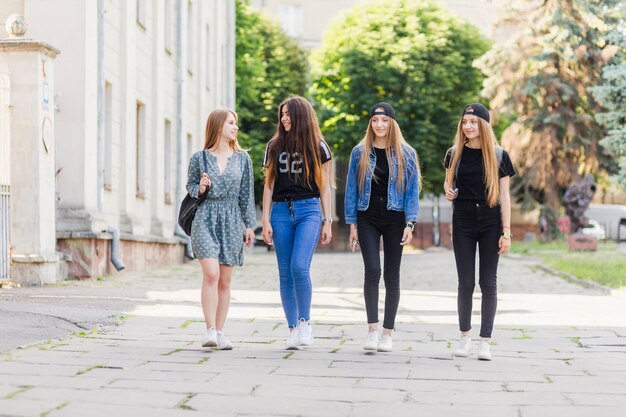 Teen girls walking after school