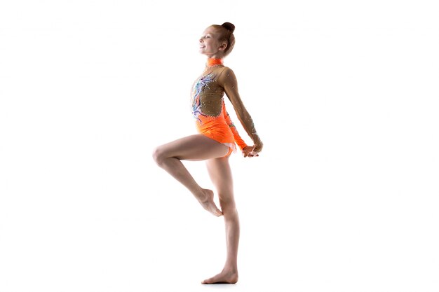 Teenage ballerina girl working out