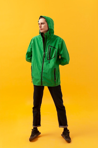 Free photo teenage boy wearing green jacket