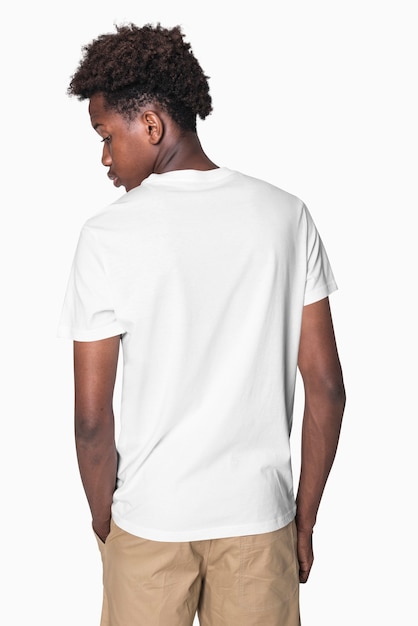 Free Photo teenage boy in white tee basic youth apparel shoot