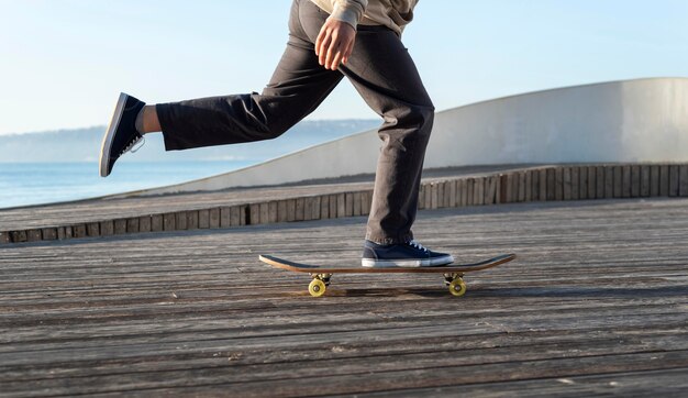 Teenage boy with skateboard close up