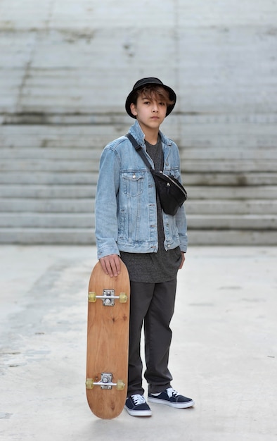 Teenage boy with skateboard