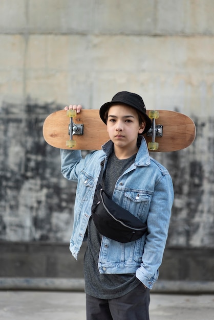 Teenage boy with skateboard