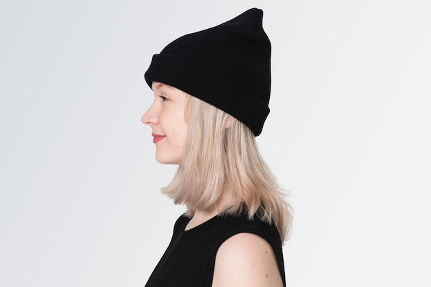 Free Photo teenage girl in black beanie profile portrait for street fashion shoot