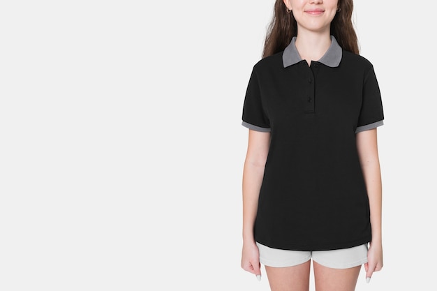 Free photo teenage girl in black polo t-shirt for sporty youth fashion shoot